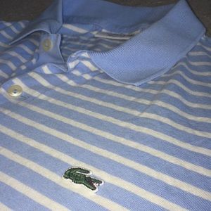 Light blue and white Lacoste polo. Good condition.